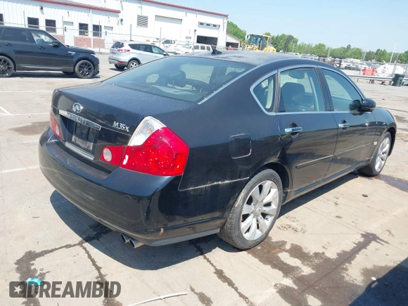 2006 Infiniti M with VIN JNKAY01FX6M255416, listed as a IAAI auction lot 42077411 with 238,560 mi miles. Bid and sale history available at carsss.com. Image 4.