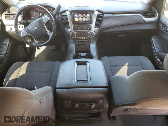 2019 Chevrolet Suburban LS with VIN 1GNSCGKC6KR180042, listed as a Copart auction lot 76829394 with 75,574 mi miles and Salvage title. Bid and sale history available at DreamBid. Image 8.