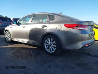 2018 Kia Optima LX with VIN 5XXGT4L32JG256921, listed as a IAAI auction lot 41389850 with 91,013 mi miles and . Bid and sale history available at DreamBid. Image 13.