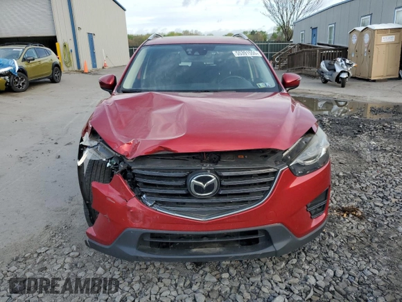 2016 Mazda CX-5 Grand Touring with VIN JM3KE4DY6G0753826, listed as a Copart auction lot 55391555 with 96,852 mi miles and Salvage Title. Bid and sale history available at DreamBid. Image 5.
