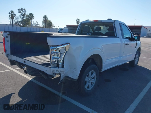 2023 Ford F-150 XL with VIN 1FTMF1C51PKD58283, listed as a IAAI auction lot 41752279 with 90,263 mi miles and . Bid and sale history available at carsss.com. Image 4.