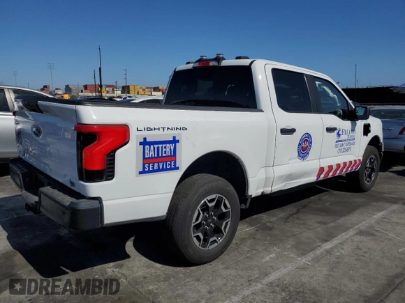 2023 Ford F-150 Lightning Pro с VIN 1FTVW1EL2PWG13712, выставлен на аукционе Copart как лот 56950955 с пробегом 60 605 миль миль и Списание • Salvage title. История ставок и продаж доступна на DreamBid. Изображение 3.