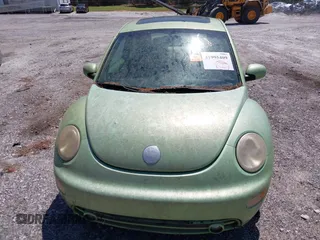 2003 Volkswagen New Beetle Coupe GLS with VIN 3VWCK21C13M406167, listed as a IAAI auction lot 41995409 with 1 mi miles. Bid and sale history available at carsss.com. Image 6.