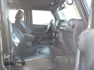 2015 Jeep Wrangler Unlimited Rubicon Hard Rock with VIN 1C4HJWFG7FL602344, listed as a IAAI auction lot 42011914 with 109,238 mi miles and . Bid and sale history available at DreamBid. Image 5.