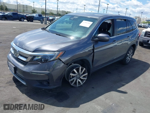2021 Honda Pilot EX-L with VIN 5FNYF5H57MB046740, listed as a IAAI auction lot 41943366 with 31,198 mi miles and . Bid and sale history available at DreamBid. Image 18.