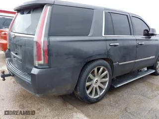 2015 Cadillac Escalade Premium with VIN 1GYS3NKJ5FR540221, listed as a IAAI auction lot 41289989 with 100,191 mi miles. Bid and sale history available at carsss.com. Image 4.