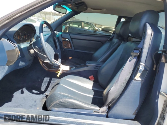 1992 Mercedes-Benz 500 z VIN WDBFA66E7NF049079, wystawiony jako Copart lot #52642285 z przebiegiem 69 976 mil mil oraz Szkody całkowita. Historia ofert i sprzedaży dostępna na DreamBid. Obrazek 7.