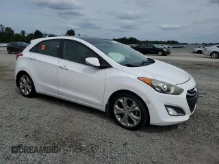 2013 Hyundai Elantra GT with VIN KMHD35LE0DU121960, listed as a Copart auction lot 71340194 with 148,280 mi miles and Salvage Title. Bid and sale history available at carsss.com. Image 4.