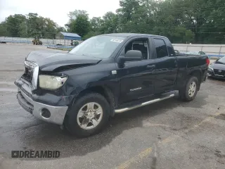 2007 Toyota Tundra SR5 with VIN 5TFRT54137X014796, listed as a Copart auction lot 56146235 with 324,066 mi miles and Salvage title. Bid and sale history available at DreamBid. Image 1.