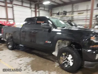 2017 Chevrolet Silverado 1500 LT with VIN 1GCVKREC3HZ183876, listed as a IAAI auction lot 41404639 with 122,367 mi miles. Bid and sale history available at carsss.com. Image 13.