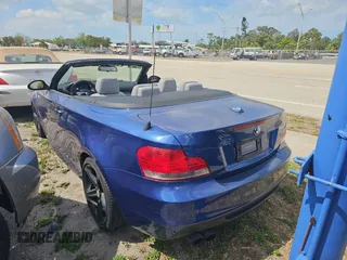 2009 BMW 1 Series 135i with VIN WBAUN93569VK41024, listed as a Copart auction lot 55591965 with 127,205 mi miles and Clean Title. Bid and sale history available at carsss.com. Image 3.