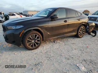 2025 BMW X6 xDrive40i with VIN 5UX33EX09S9Y26463, listed as a Copart auction lot 84269334 with 1,970 mi miles and Salvage Title. Bid and sale history available at carsss.com. Image 1.