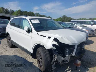 2021 Volkswagen Tiguan SE with VIN 3VV3B7AX7MM080266, listed as a IAAI auction lot 42062147 with 66,786 mi miles and . Bid and sale history available at DreamBid. Image 12.