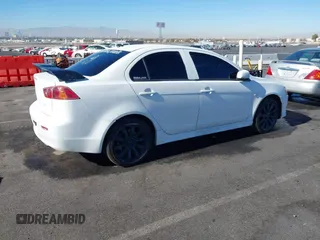 2009 Mitsubishi Lancer GTS with VIN JA3AU86W89U009617, listed as a IAAI auction lot 41409767 with 215,559 mi miles and . Bid and sale history available at carsss.com. Image 4.