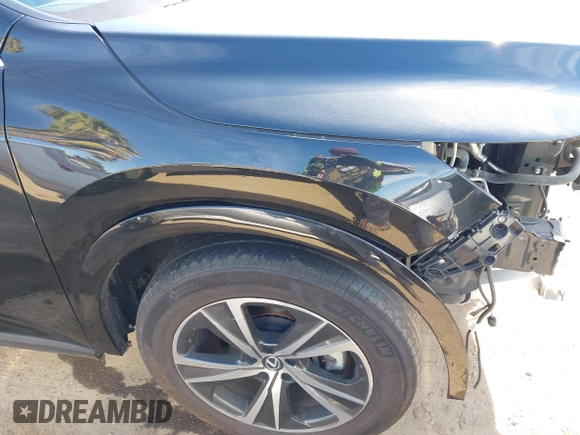 2023 Lexus RX 350h с VIN 2T2BBMCA7PC008476, выставлен на аукционе IAAI как лот 41857700 с пробегом 24 821 миль миль и . История ставок и продаж доступна на DreamBid. Изображение 19.