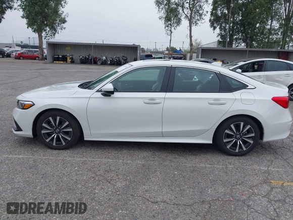 2024 Honda Civic EX z VIN 2HGFE1F77RH337748, wystawiony jako IAAI lot #42047010 z przebiegiem 5 598 mil mil oraz . Historia ofert i sprzedaży dostępna na DreamBid. Obrazek 14.