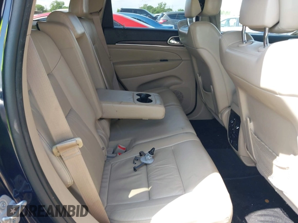 2014 Jeep Grand Cherokee Limited with VIN 1C4RJEBG9EC201512, listed as a IAAI auction lot 42091266 with 129,897 mi miles and . Bid and sale history available at DreamBid. Image 8.