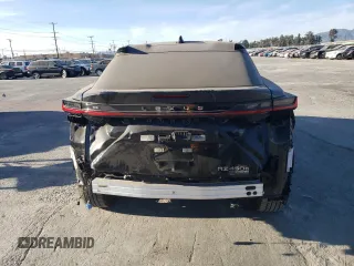 2023 Lexus RZ 450e Premium z VIN JTJAAAAB9PA007621, wystawiony jako Copart lot #80594143 z przebiegiem 7673 mil mil oraz Szkody całkowita. Historia ofert i sprzedaży dostępna na DreamBid. Obrazek 6.