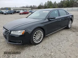 2016 Audi A8 L 3.0T with VIN WAU34AFD4GN021865, listed as a Copart auction lot 44164625 with 101,019 mi miles and Salvage Title. Bid and sale history available at carsss.com. Image 1.