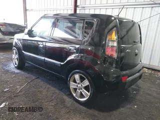 2010 Kia Soul + with VIN KNDJT2A21A7095510, listed as a IAAI auction lot 41879972 with 212,538 mi miles. Bid and sale history available at carsss.com. Image 3.