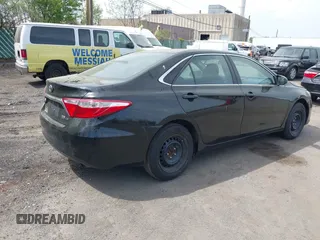 2015 Toyota Camry LE with VIN 4T1BD1FK2FU175455, listed as a IAAI auction lot 42119277 with 199,924 mi miles and . Bid and sale history available at DreamBid. Image 4.