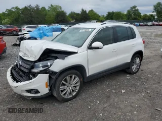 2014 Volkswagen Tiguan SE z VIN WVGAV3AX5EW551477, wystawiony jako Copart lot #55773245 z przebiegiem 153 437 mil mil oraz Czysty tytuł • Clean title. Historia ofert i sprzedaży dostępna na DreamBid. Obrazek 1.