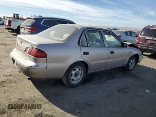 1999 Toyota Corolla VE with VIN 2T1BR12E2XC249817, listed as a Copart auction lot 86552414 with Not provided miles and Salvage title. Bid and sale history available at DreamBid. Image 3.