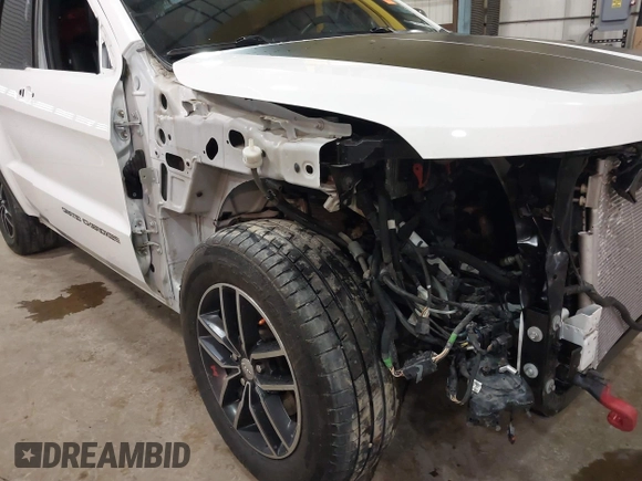 2018 Jeep Grand Cherokee Trailhawk with VIN 1C4RJFLG8JC267810, listed as a IAAI auction lot 41221229 with 108,228 mi miles and . Bid and sale history available at DreamBid. Image 18.