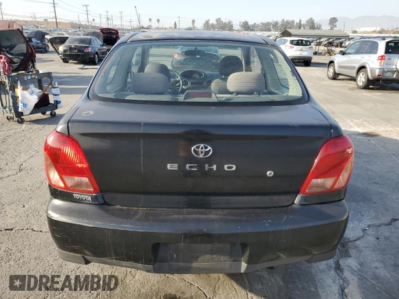 2000 Toyota ECHO with VIN JTDAT1234Y0040781, listed as a Copart auction lot 87408064 with 158,235 mi miles and Salvage Title. Bid and sale history available at DreamBid. Image 6.