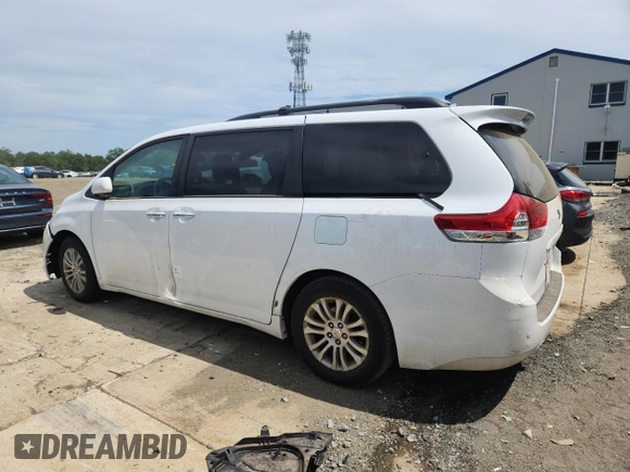 2011 Toyota Sienna XLE AAS с VIN 5TDYK3DC1BS017540, выставлен на аукционе Copart как лот 65177255 с пробегом 164 604 миль миль и Списание • Salvage title. История ставок и продаж доступна на DreamBid. Изображение 2.