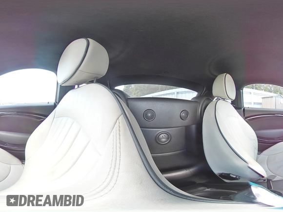 2012 MINI Coupe S z VIN WMWSX3C56CT154872, wystawiony jako Copart lot #68011264 z przebiegiem 91 650 mil mil oraz Szkody całkowita. Historia ofert i sprzedaży dostępna na DreamBid. Obrazek 12.