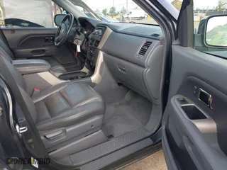 2006 Honda Pilot EX-L with VIN 2HKYF18536H538744, listed as a IAAI auction lot 42025277 with 203,012 mi miles. Bid and sale history available at carsss.com. Image 5.
