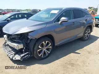 2021 Lexus RX 450h with VIN 2T2HGMDA6MC065516, listed as a IAAI auction lot 42162407 with 81,501 mi miles and . Bid and sale history available at DreamBid. Image 2.