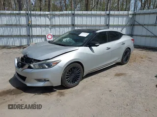 2016 Nissan Maxima SV z VIN 1N4AA6APXGC383279, wystawiony jako IAAI lot #42144003 z przebiegiem 141 099 mil mil oraz . Historia ofert i sprzedaży dostępna na DreamBid. Obrazek 2.