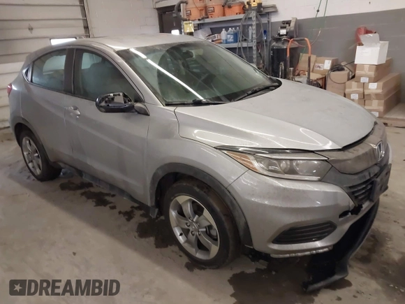 2021 Honda HR-V LX with VIN 3CZRU6H33MM746713, listed as a IAAI auction lot 41973303 with 56,476 mi miles. Bid and sale history available at carsss.com. Image 1.
