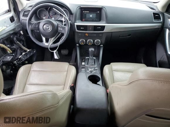 2016 Mazda CX-5 Touring z VIN JM3KE2CY5G0849288, wystawiony jako Copart lot #54594545 z przebiegiem 90 882 mil mil oraz Szkoda całkowita • Salvage title. Historia ofert i sprzedaży dostępna na DreamBid. Obrazek 8.