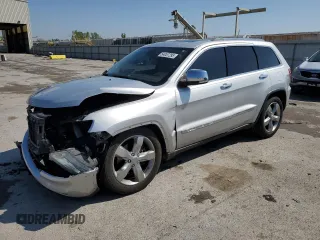 2011 Jeep Grand Cherokee Overland with VIN 1J4RR6GTXBC722555, listed as a Copart auction lot 54057295 with 105,117 mi miles and Salvage title. Bid and sale history available at DreamBid. Image 1.