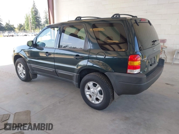 2003 Ford Escape XLT Popular 2 with VIN 1FMCU931X3KC16646, listed as a IAAI auction lot 42160863 with 130,603 mi miles and . Bid and sale history available at DreamBid. Image 3.
