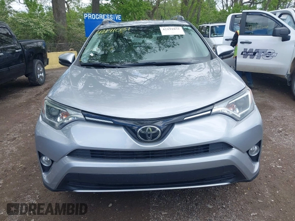 2018 Toyota RAV4 XLE z VIN 2T3WFREV1JW427878, wystawiony jako IAAI lot #42191031 z przebiegiem 97 264 mil mil oraz . Historia ofert i sprzedaży dostępna na DreamBid. Obrazek 12.