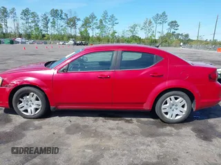 2013 Dodge Avenger SE with VIN 1C3CDZABXDN529054, listed as a IAAI auction lot 41881632 with 179,519 mi miles and . Bid and sale history available at DreamBid. Image 14.