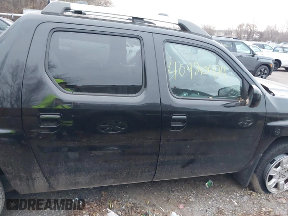 2007 Honda Ridgeline RTL z VIN 2HJYK16527H510681, wystawiony jako IAAI lot #40920924 z przebiegiem Nie podano mil oraz . Historia ofert i sprzedaży dostępna na DreamBid. Obrazek 13.
