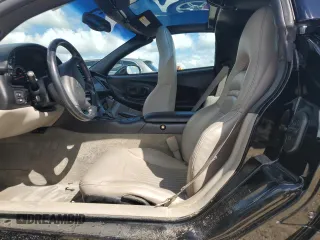 2002 Chevrolet Corvette with VIN 1G1YY22G225121306, listed as a Copart auction lot 74079384 with 0 mi miles and Salvage Title. Bid and sale history available at carsss.com. Image 7.