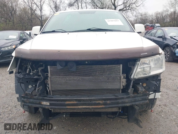 2012 Dodge Journey SXT with VIN 3C4PDCCG6CT132457, listed as a IAAI auction lot 41907657 with 169,160 mi miles and . Bid and sale history available at DreamBid. Image 6.