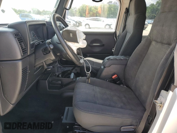 2005 Jeep Wrangler Sport z VIN 1J4FA49S75P324462, wystawiony jako Copart lot #59818995 z przebiegiem 183 558 mil mil oraz Nie do naprawy • Non repairable. Historia ofert i sprzedaży dostępna na DreamBid. Obrazek 7.