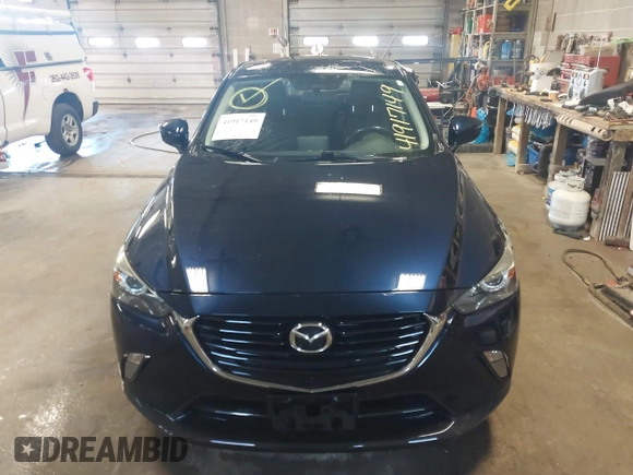 2017 Mazda CX-3 Touring with VIN JM1DKFC72H0145267, listed as a IAAI auction lot 41917149 with 55,784 mi miles. Bid and sale history available at carsss.com. Image 12.