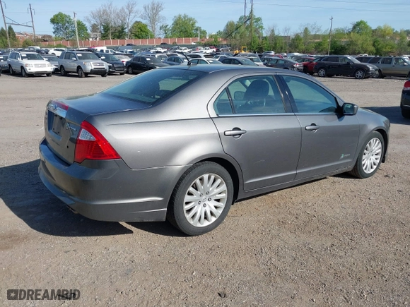 2011 Ford Fusion Hybrid with VIN 3FADP0L34BR290335, listed as a IAAI auction lot 42094674 with 171,391 mi miles. Bid and sale history available at carsss.com. Image 4.