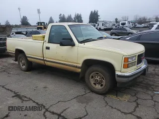 1997 GMC Sierra 1500 with VIN 1GTGC24R4VZ546832, listed as a Copart auction lot 87954535 with 411,941 mi miles and Clean Title. Bid and sale history available at DreamBid. Image 4.