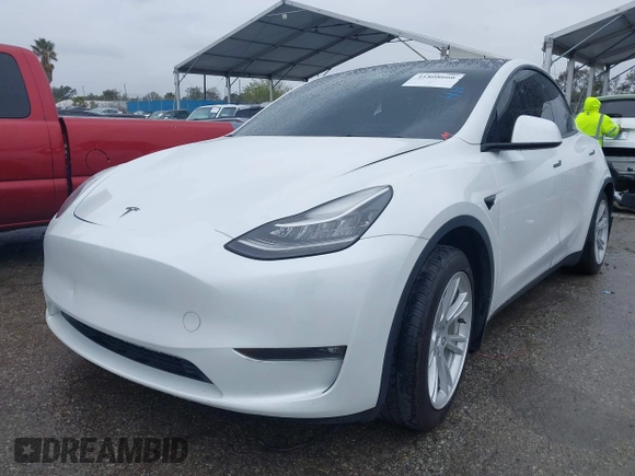 2021 Tesla Model Y Long Range with VIN 5YJYGAEE2MF260142, listed as a IAAI auction lot 41808666 with 87,316 mi miles and . Bid and sale history available at DreamBid. Image 16.
