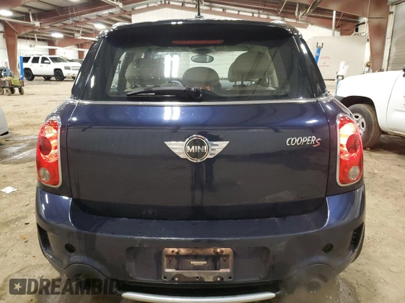 2013 MINI Countryman S ALL4 with VIN WMWZC5C5XDWM16477, listed as a Copart auction lot 51666385 with 112,383 mi miles and Salvage title. Bid and sale history available at DreamBid. Image 6.