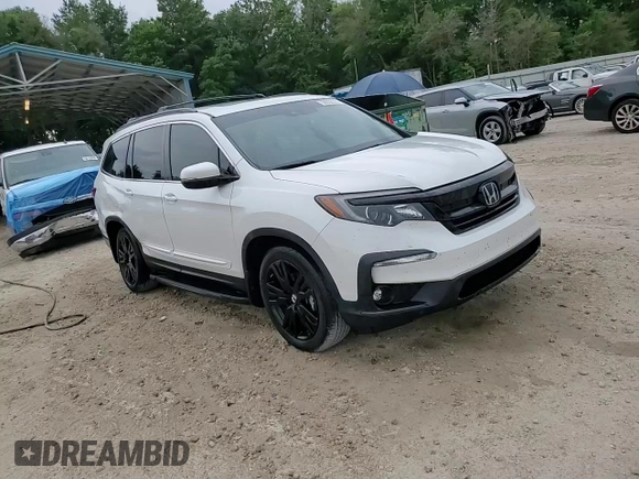 2021 Honda Pilot Special Edition z VIN 5FNYF6H2XMB022654, wystawiony jako Copart lot #58832335 z przebiegiem 32 493 mil mil oraz Szkoda całkowita • Salvage title. Historia ofert i sprzedaży dostępna na DreamBid. Obrazek 14.